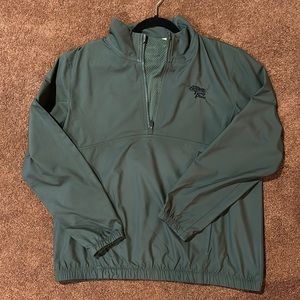 NWOT. Women’s Puma windbreaker anorak jacket. Torrey Pines golf edition. Size L.